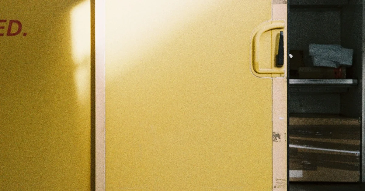 Pos Laju rate card displayed on a Malaysian ecommerce seller workstation with parcels ready for shipping